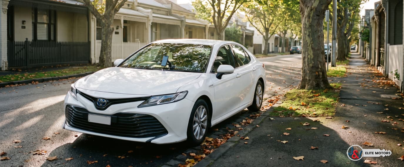 Used Toyota Camry Hybrid parked kerbside, a popular choice for Uber drivers in Australia