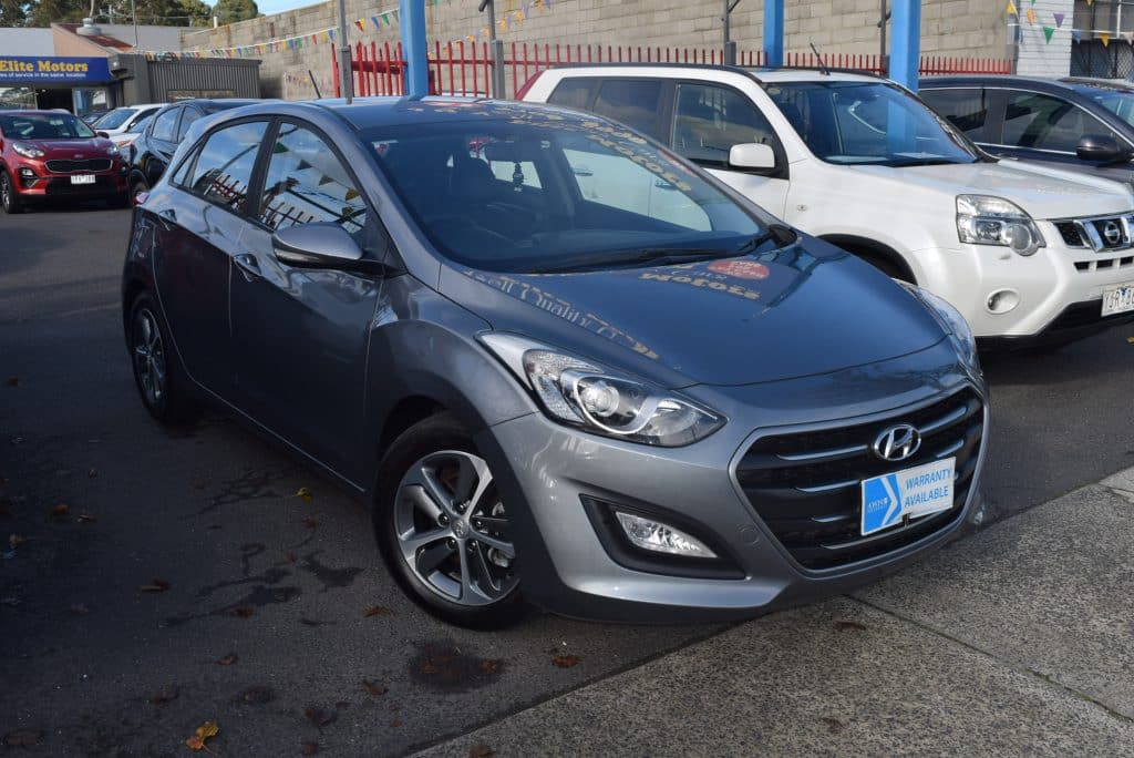 Front passenger side view of the grey Hyundai i30 hatchback